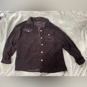 Over sized corduroy jacket. Chest pockets.